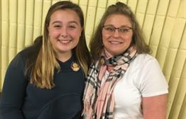 Elizabeth (on right) with a fellow judge at a First Lego League Challenge.