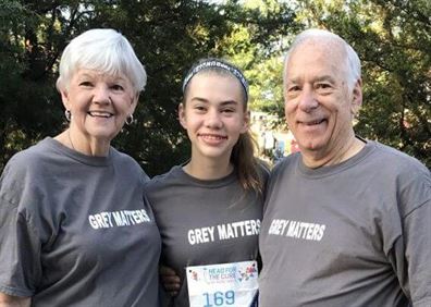 John and Judy Hoffman with their granddaughter.